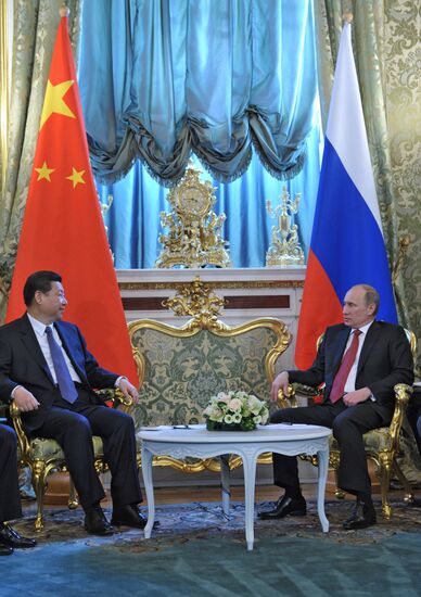 Vladimir Putin meets with Xi Jinping