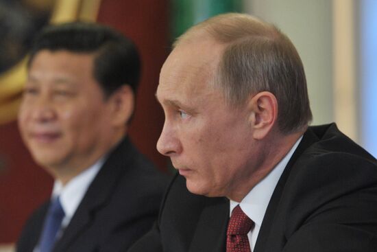 Vladimir Putin meets with Xi Jinping