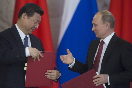 Vladimir Putin meets with Xi Jinping