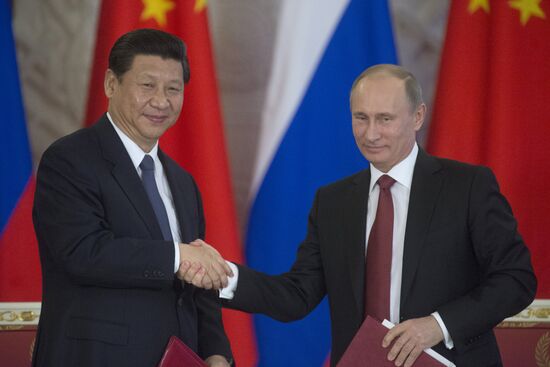 Vladimir Putin meets with Xi Jinping