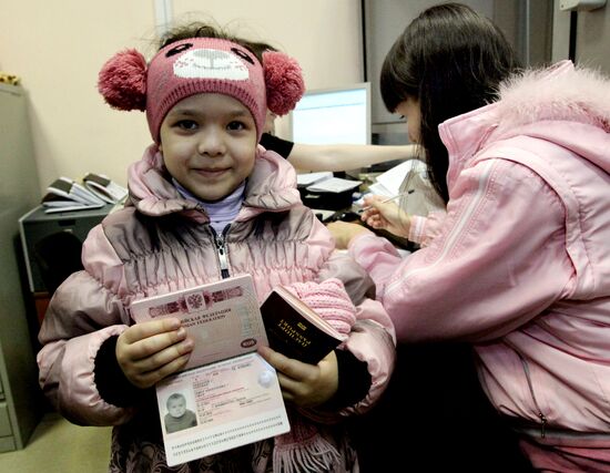 Processing and issuing biometric foreign passports