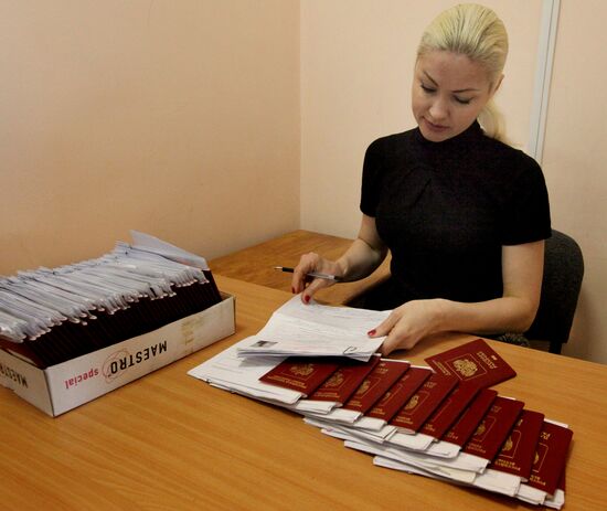 Processing and issuing biometric foreign passports