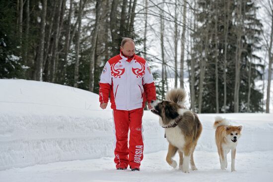 Vladimir Putin walks his dogs in Moscow Region