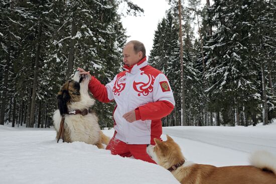Vladimir Putin walks his dogs in Moscow Region