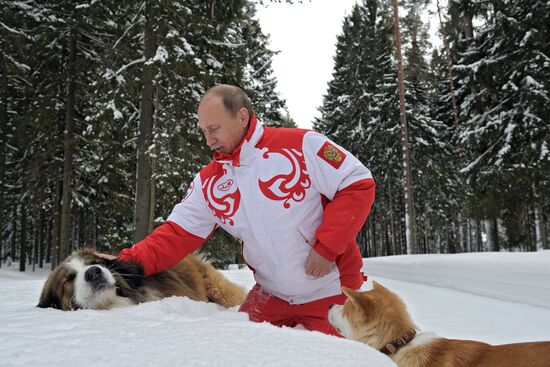 Vladimir Putin walks his dogs in Moscow Region