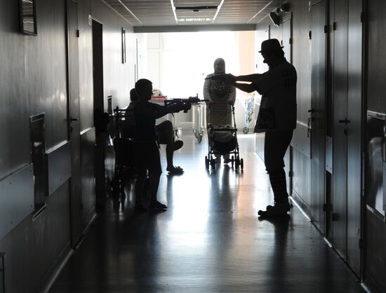 Clown doctors perform in pediatric clinical hospital
