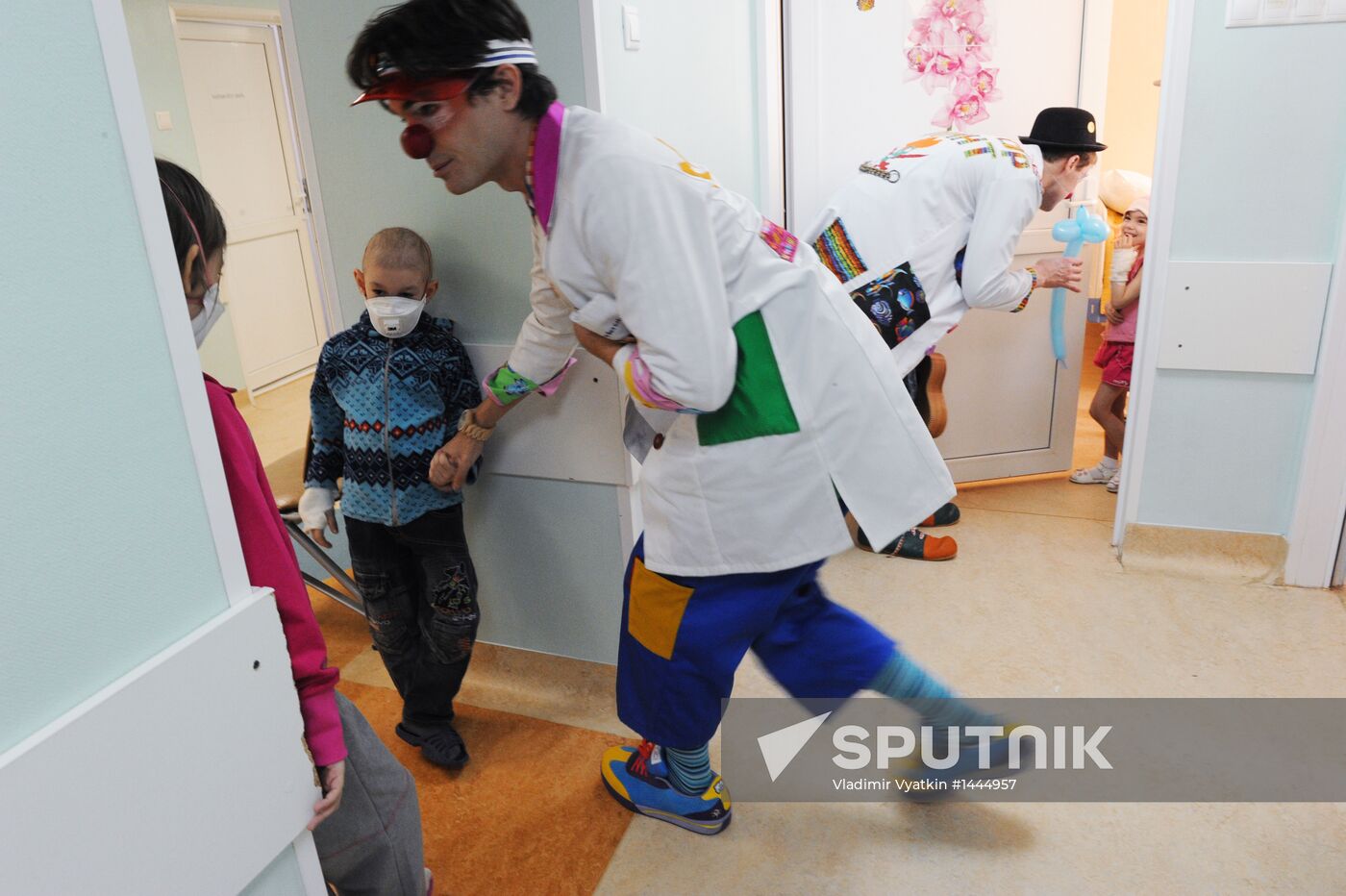 Clown doctors perform in pediatric clinical hospital