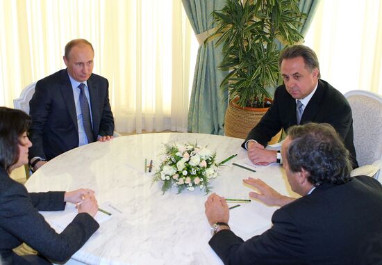 Vladimir Putin meets with Michel Platini