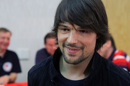 Vladimir Putin attends screening of film Legend No. 17