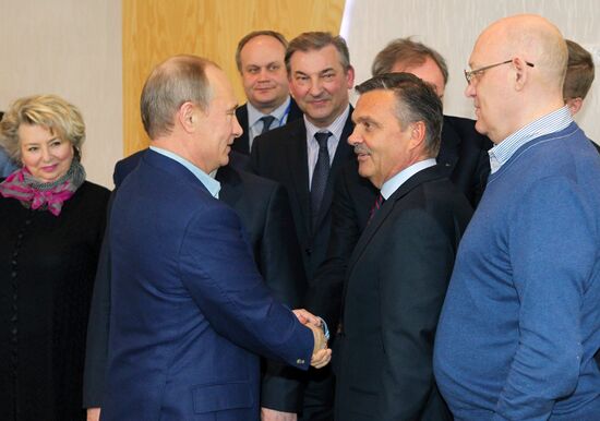 Vladimir Putin attends screening of film Legend No. 17