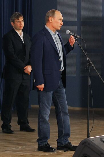Vladimir Putin attends screening of film Legend No. 17