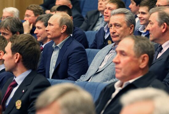 Vladimir Putin attends screening of film Legend No. 17