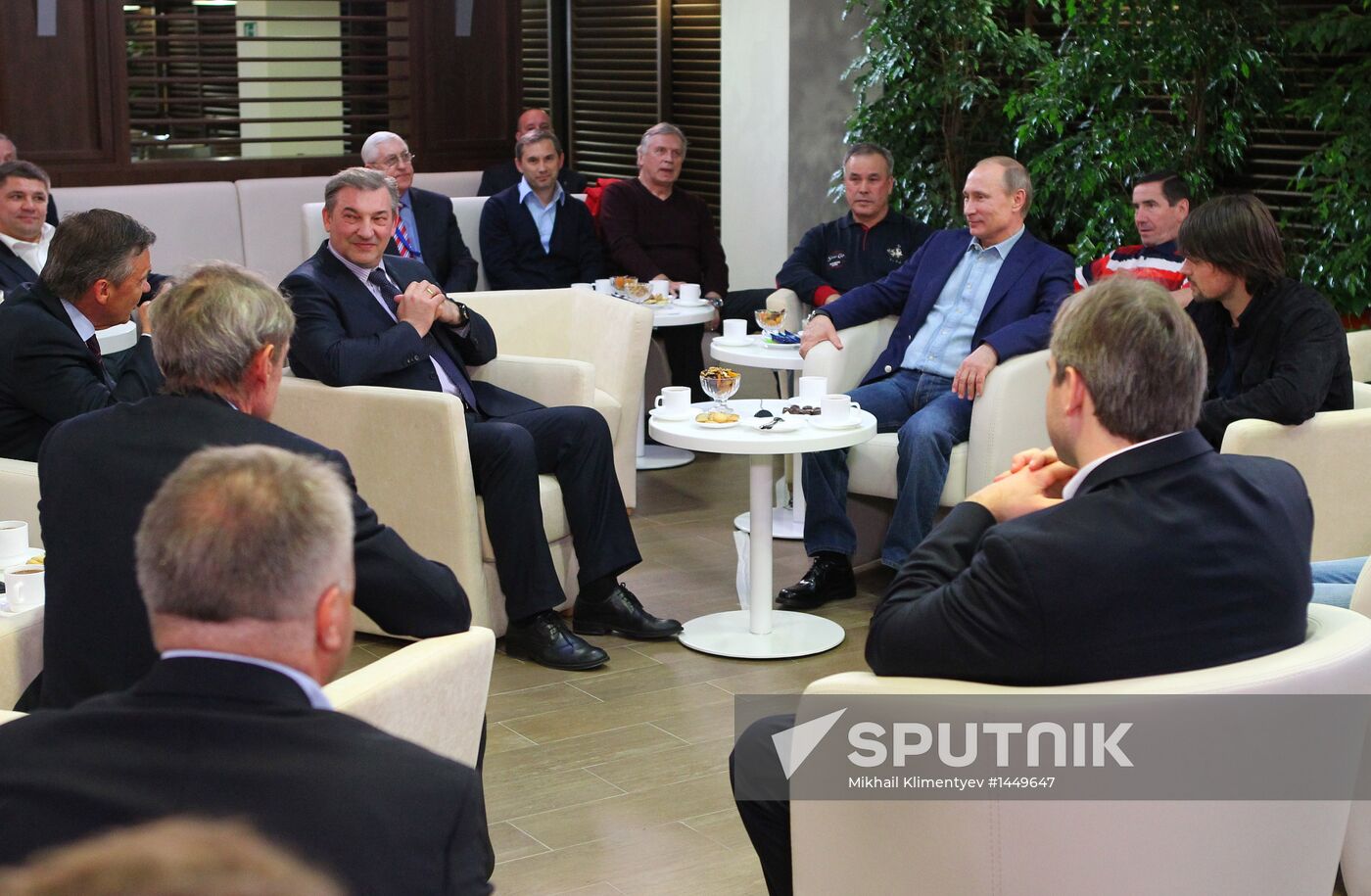 Vladimir Putin attends screening of film Legend No. 17