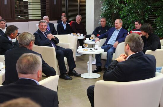 Vladimir Putin attends screening of film Legend No. 17