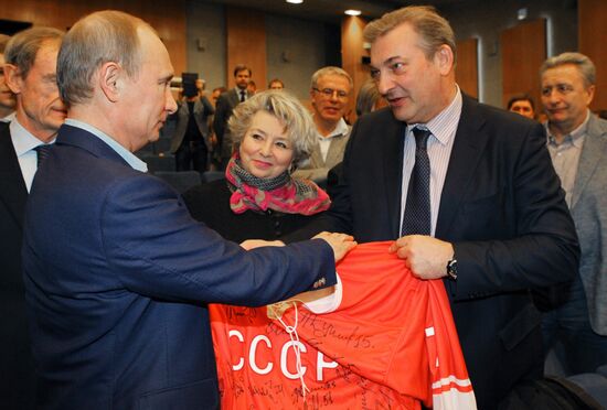 Vladimir Putin attends screening of film Legend No. 17