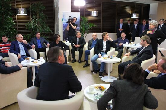 Vladimir Putin attends screening of film Legend No. 17