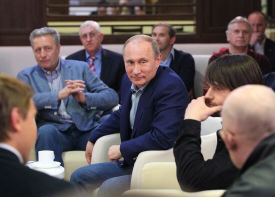 Vladimir Putin attends screening of film Legend No. 17