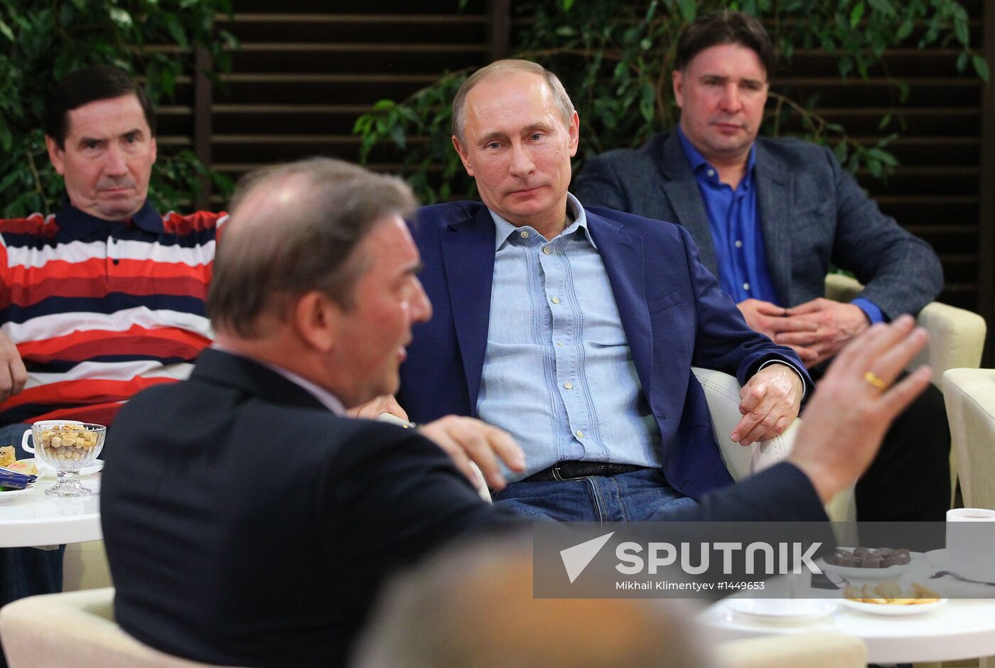 Vladimir Putin attends screening of film Legend No. 17