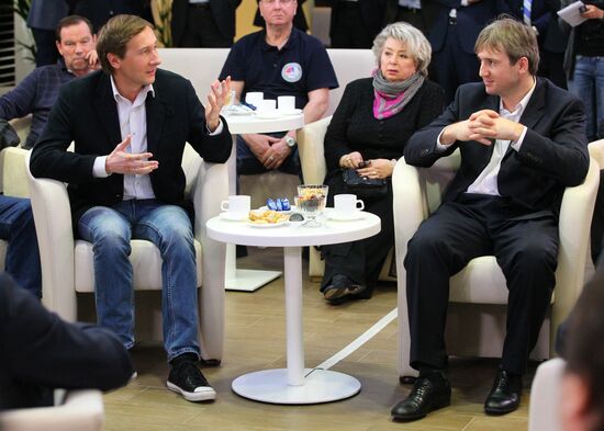 Vladimir Putin attends screening of film Legend No. 17