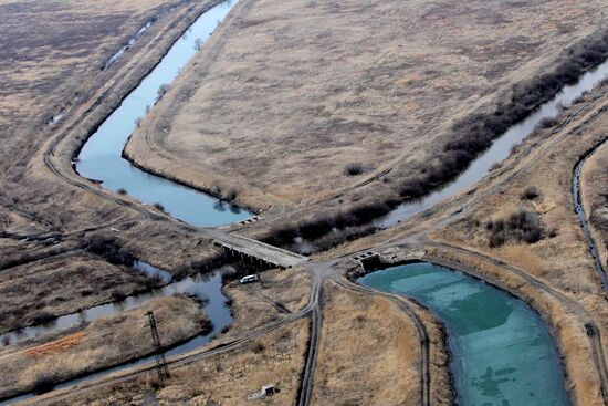 Rescue teams conduct aerial reconnaissance of flooded areas