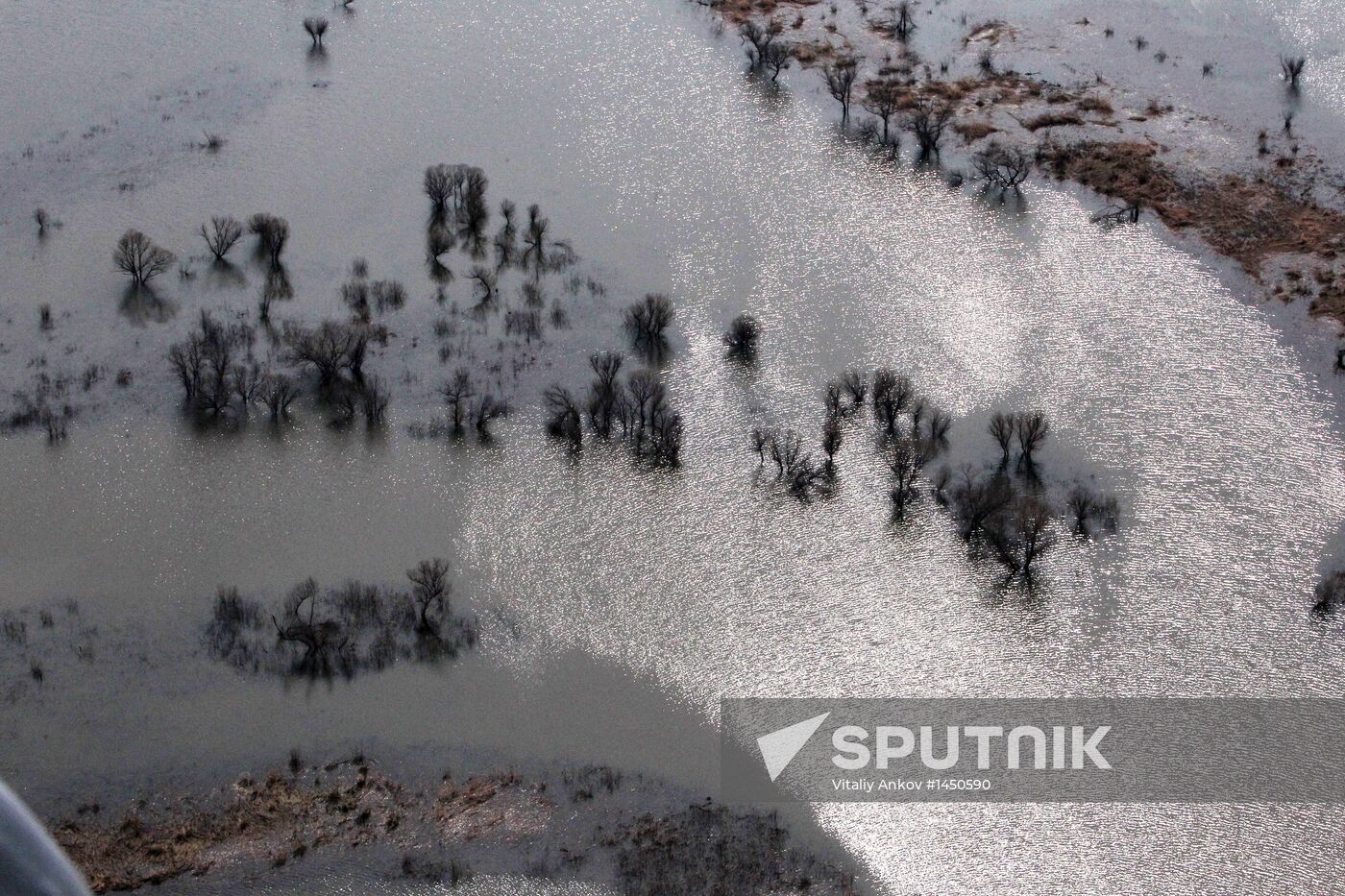 Rescue teams conduct aerial reconnaissance of flooded areas