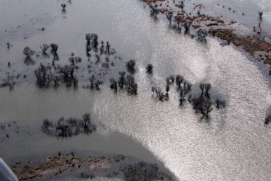 Rescue teams conduct aerial reconnaissance of flooded areas