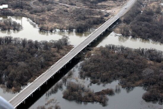 Rescue teams conduct aerial reconnaissance of flooded areas
