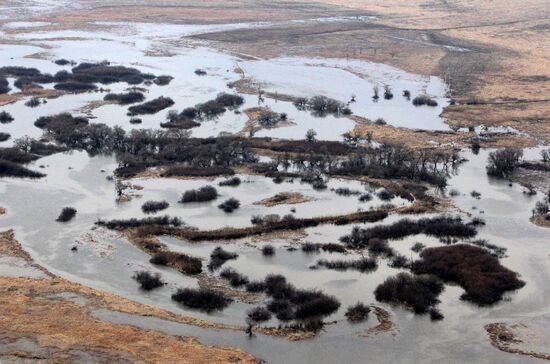 Rescue teams conduct aerial reconnaissance of flooded areas