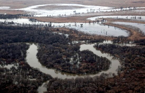 Rescue teams conduct aerial reconnaissance of flooded areas