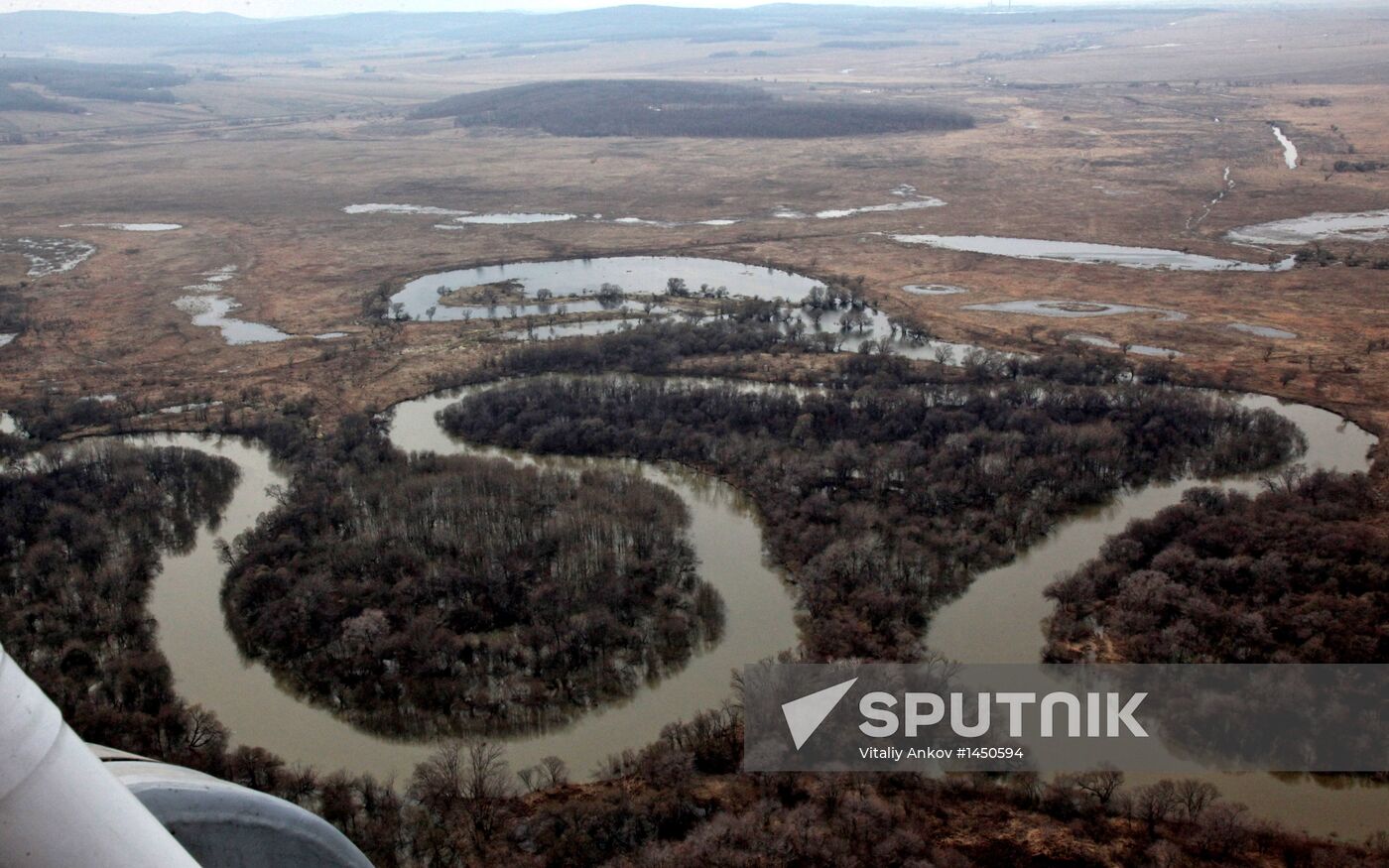 Rescue teams conduct aerial reconnaissance of flooded areas