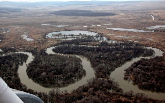 Rescue teams conduct aerial reconnaissance of flooded areas