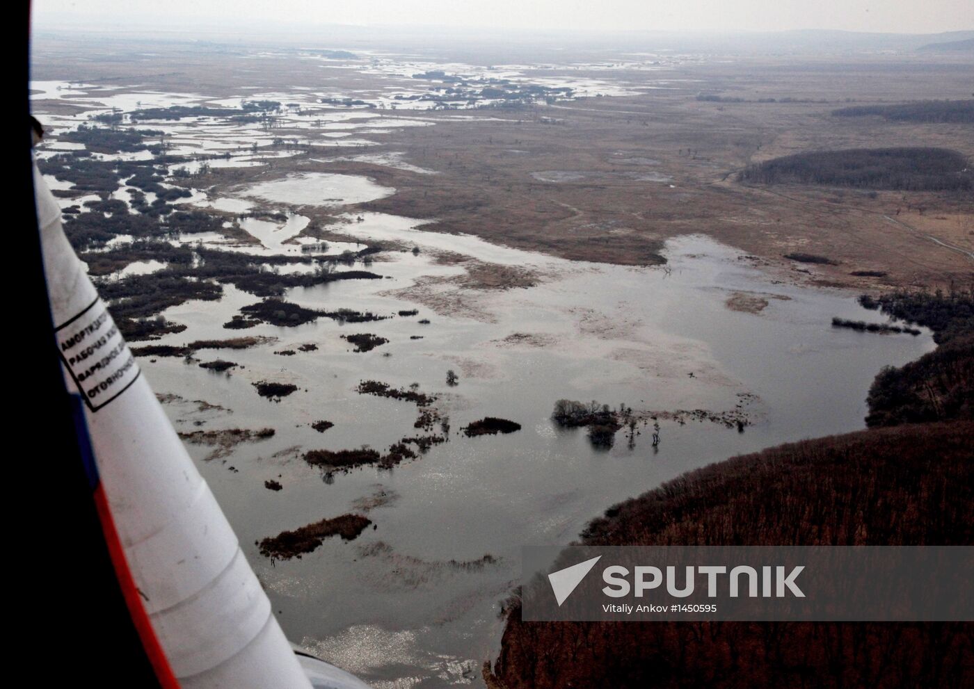 Rescue teams conduct aerial reconnaissance of flooded areas