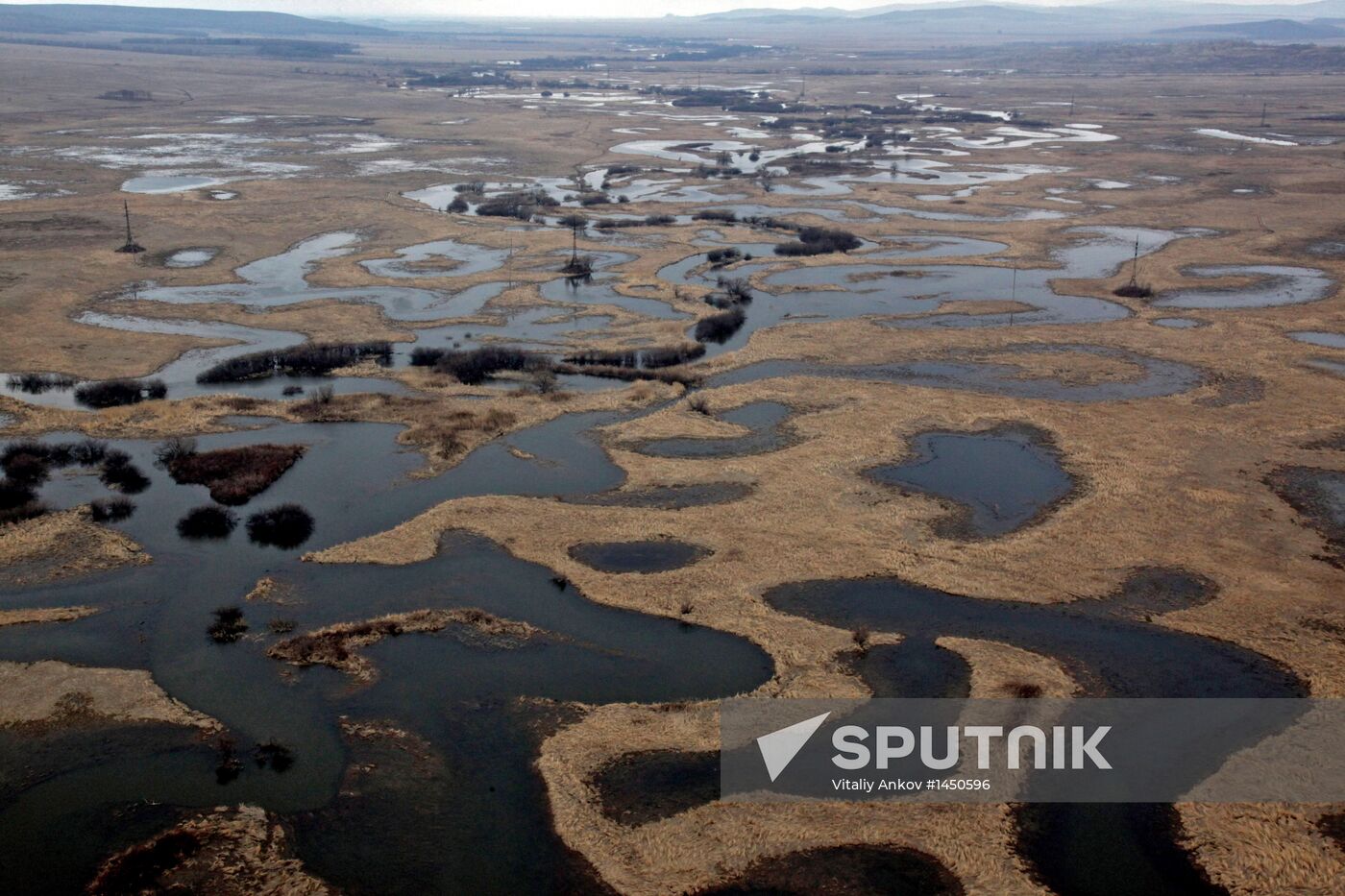 Rescue teams conduct aerial reconnaissance of flooded areas