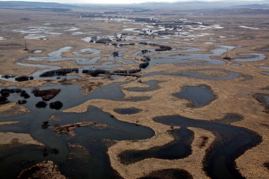 Rescue teams conduct aerial reconnaissance of flooded areas
