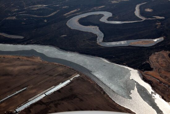 Rescue teams conduct aerial reconnaissance of flooded areas