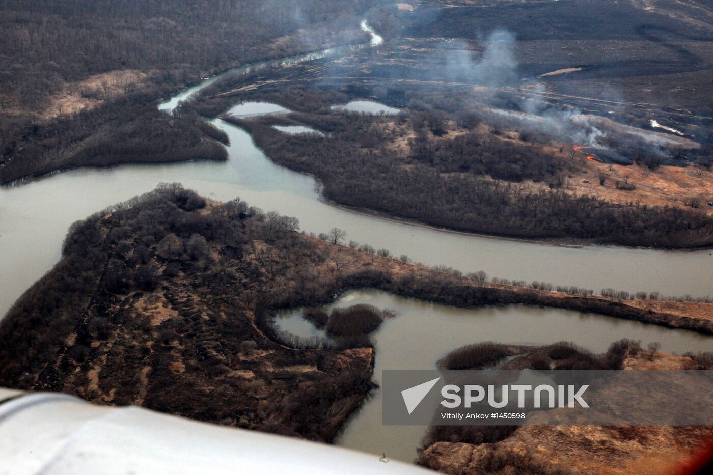 Rescue teams conduct aerial reconnaissance of flooded areas