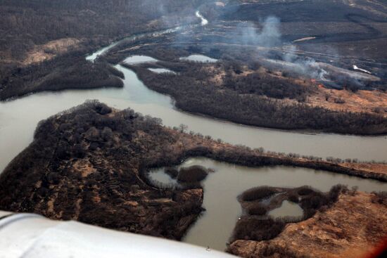 Rescue teams conduct aerial reconnaissance of flooded areas