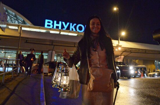 Meeting Holy Fire from Jerusalem at Vnukovo airport