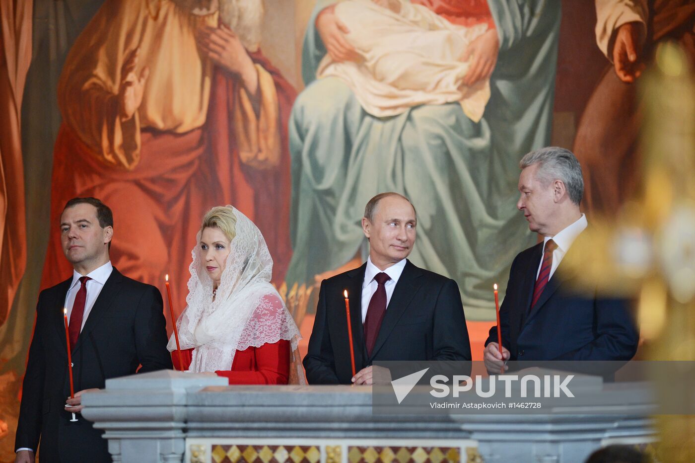 Vladimir Putin and Dmitry Medvedev attend Easter service