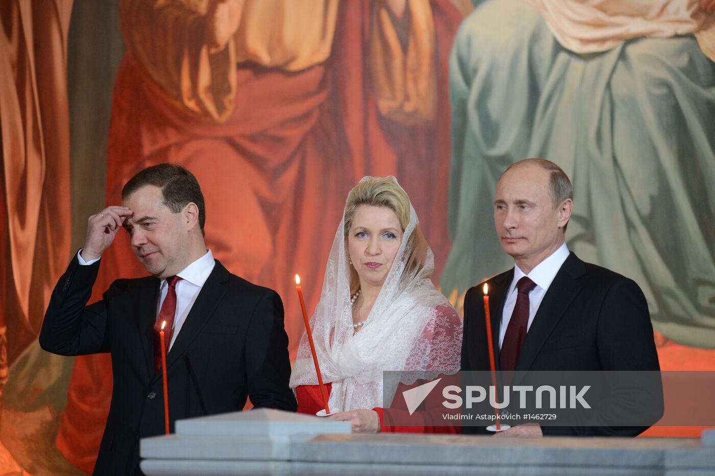 Vladimir Putin and Dmitry Medvedev attend Easter service