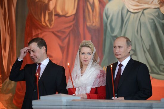 Vladimir Putin and Dmitry Medvedev attend Easter service