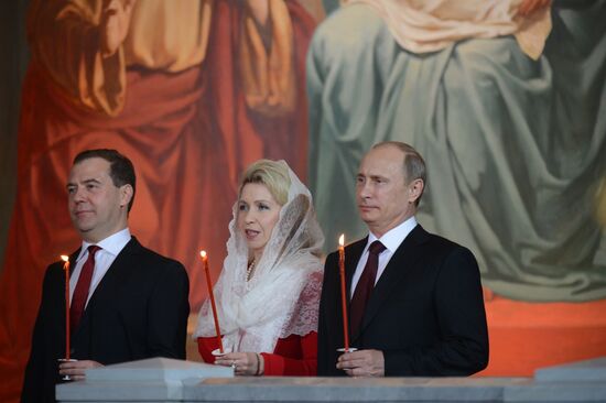 Vladimir Putin and Dmitry Medvedev attend Easter service