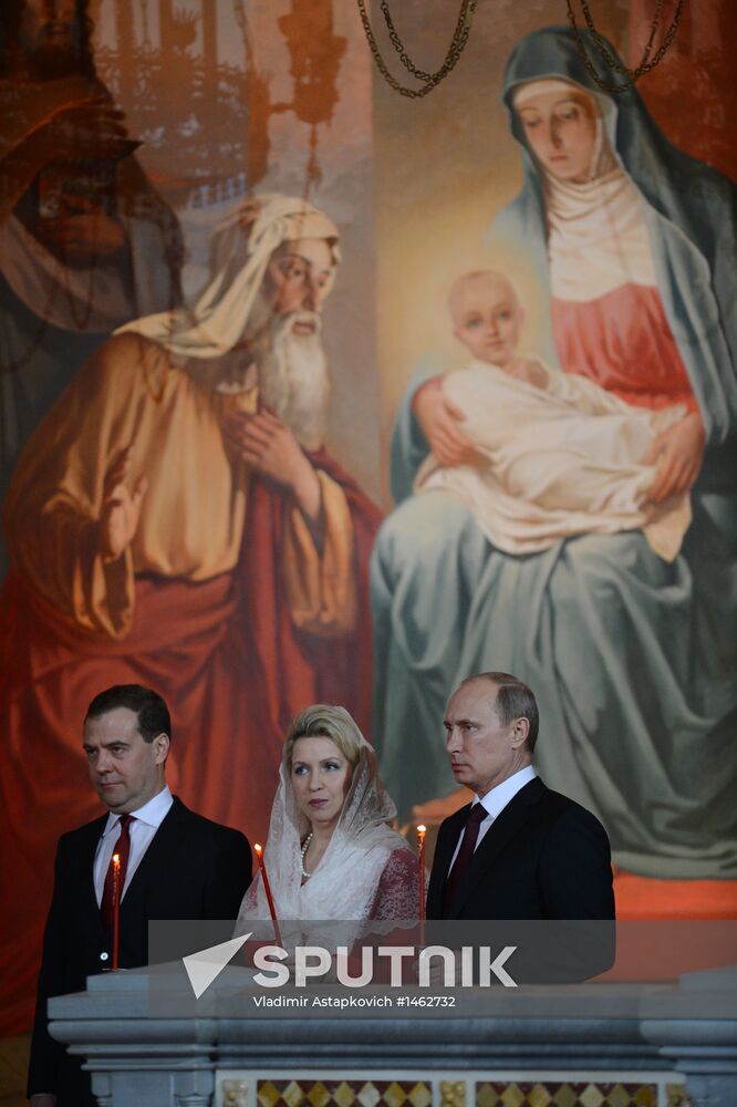 Vladimir Putin and Dmitry Medvedev attend Easter service
