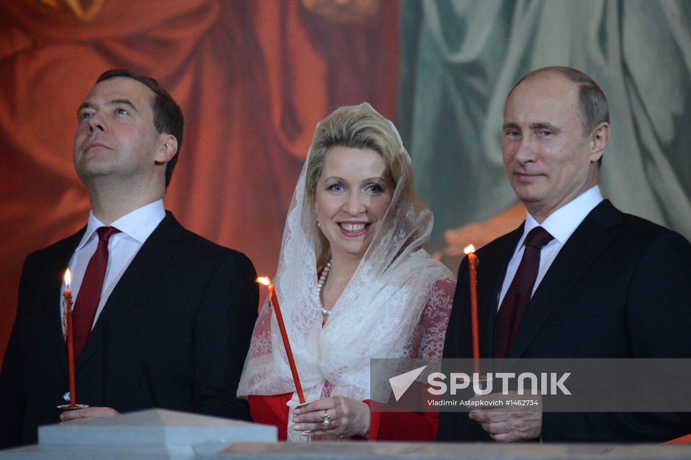 Vladimir Putin and Dmitry Medvedev attend Easter service