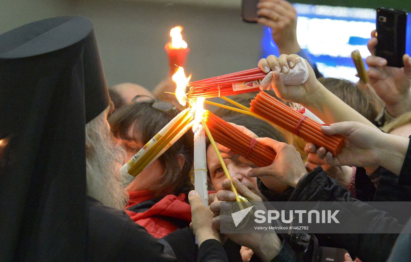Meeting Holy Fire from Jerusalem at Vnukovo airport