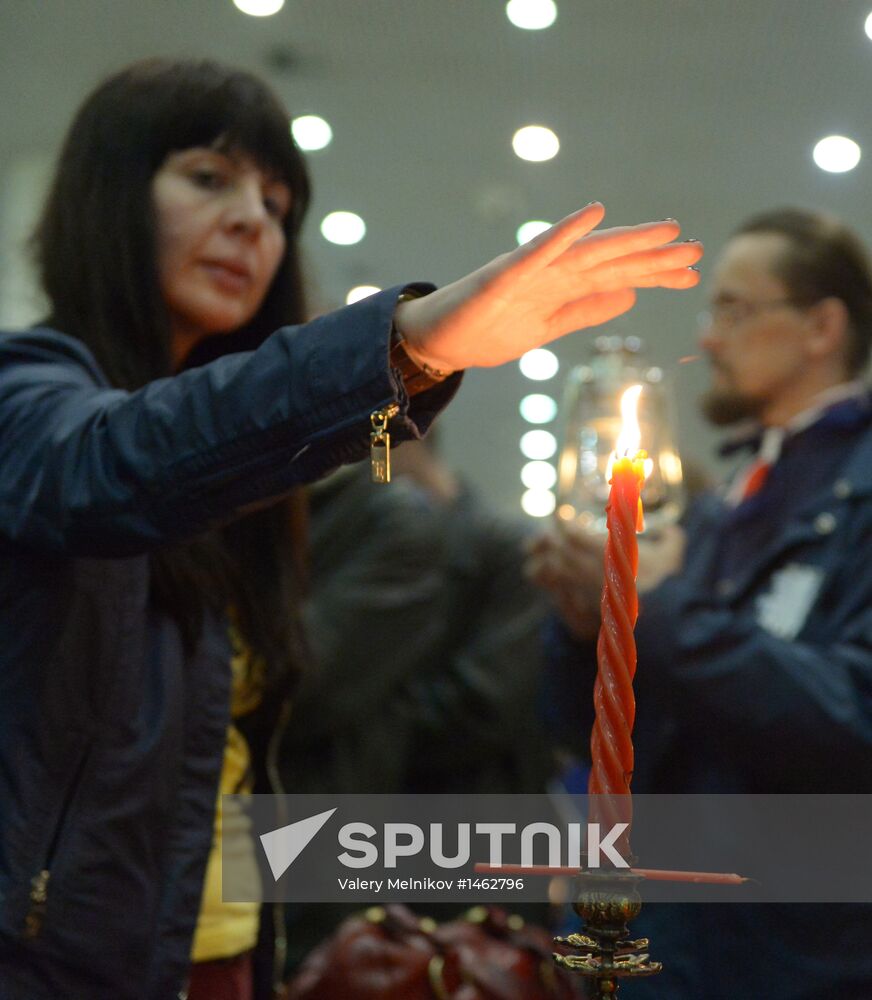 Meeting Holy Fire from Jerusalem at Vnukovo airport
