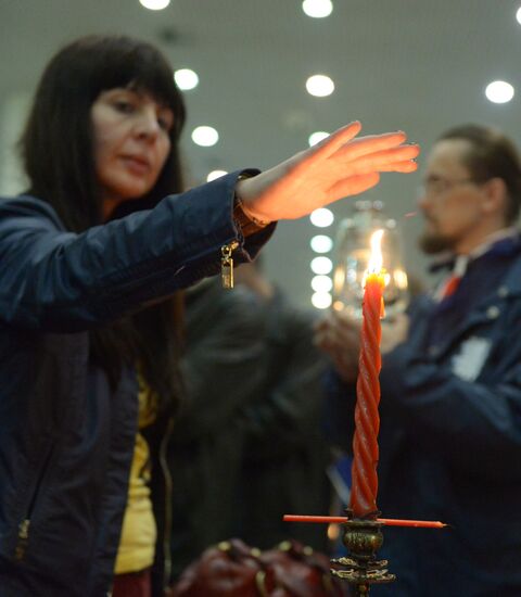 Meeting Holy Fire from Jerusalem at Vnukovo airport