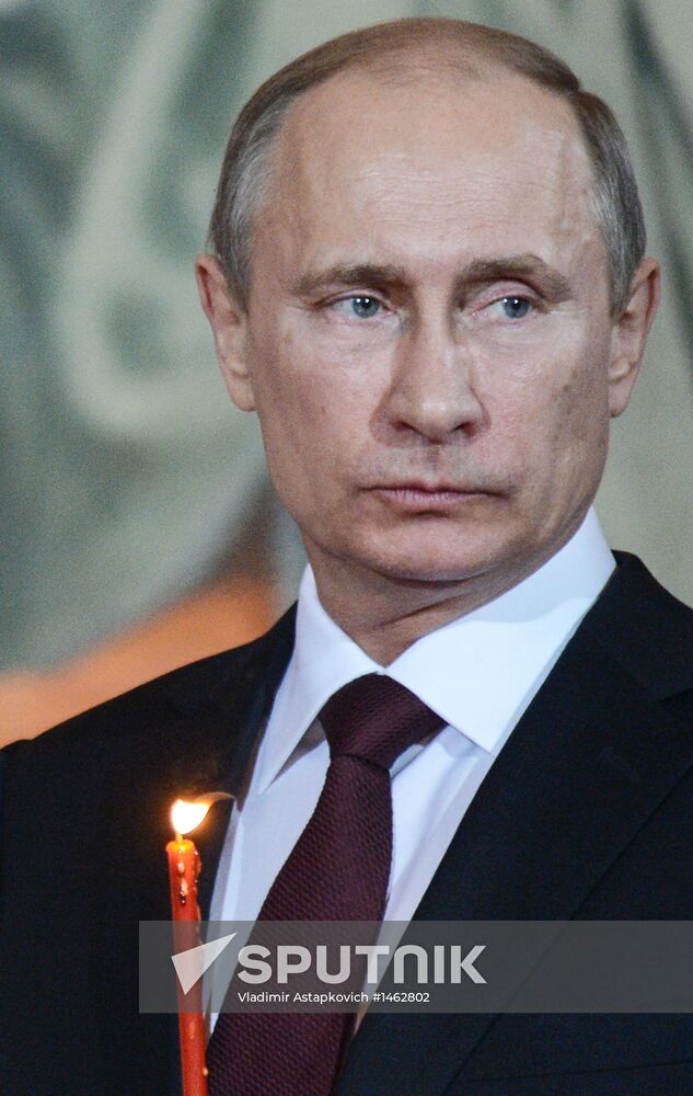 Vladimir Putin and Dmitry Medvedev attend Easter service