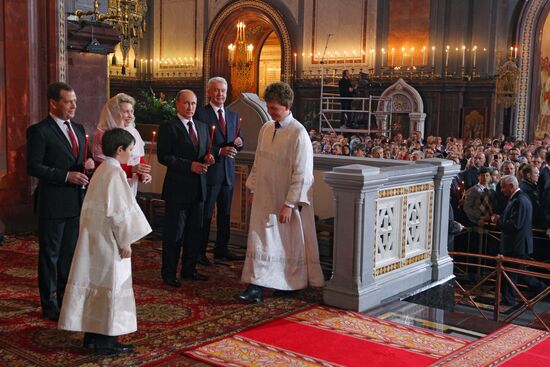 Vladimir Putin and Dmitry Medvedev attend Easter service