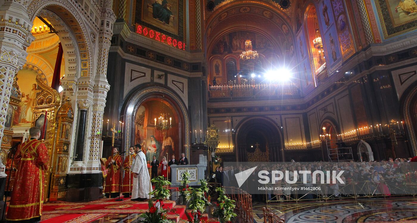 Vladimir Putin and Dmitry Medvedev attend Easter service